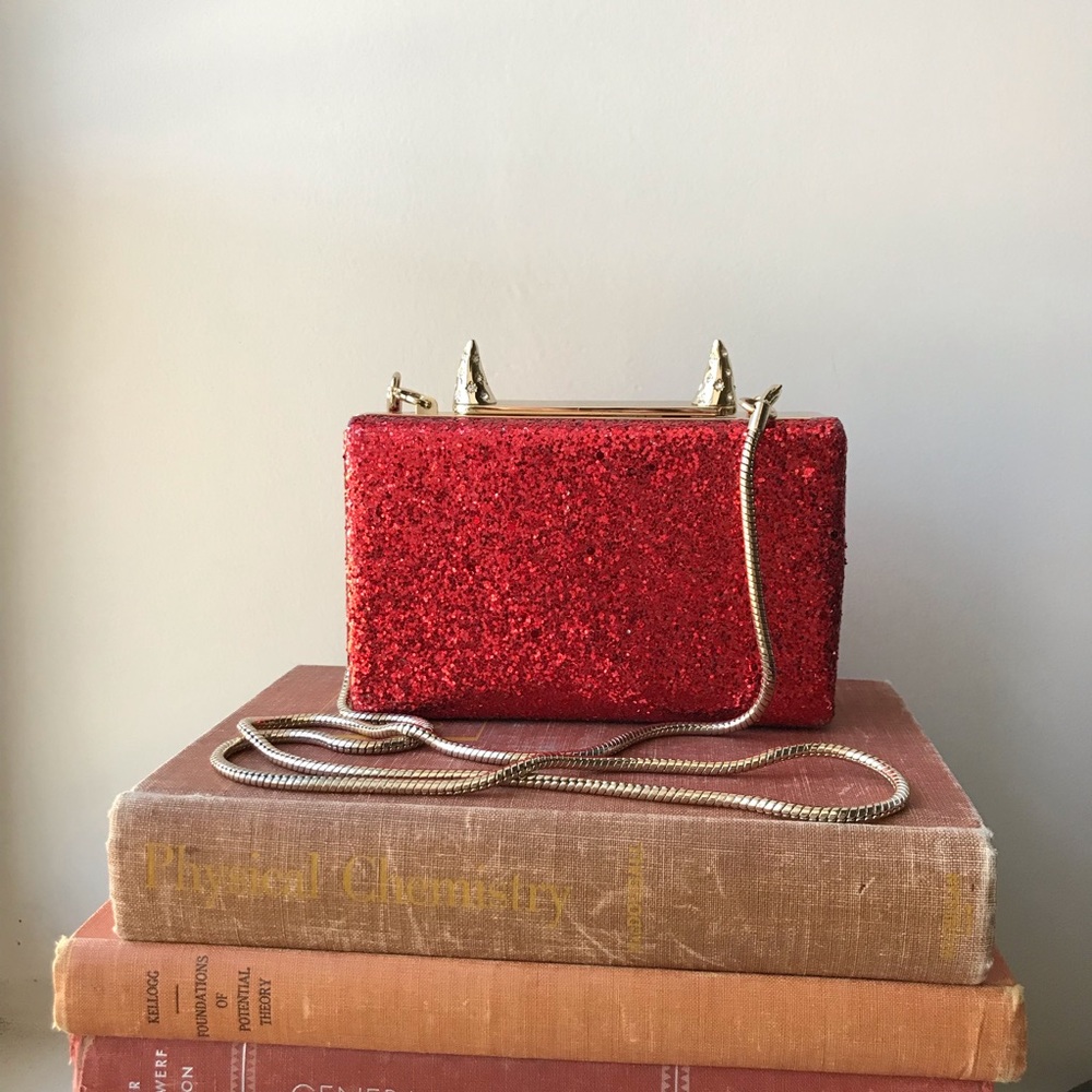 Kate Spade place your bets Ravi horn clutch